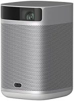 Compact silver and grey cylindrical portable projector with a mesh-textured speaker exterior.