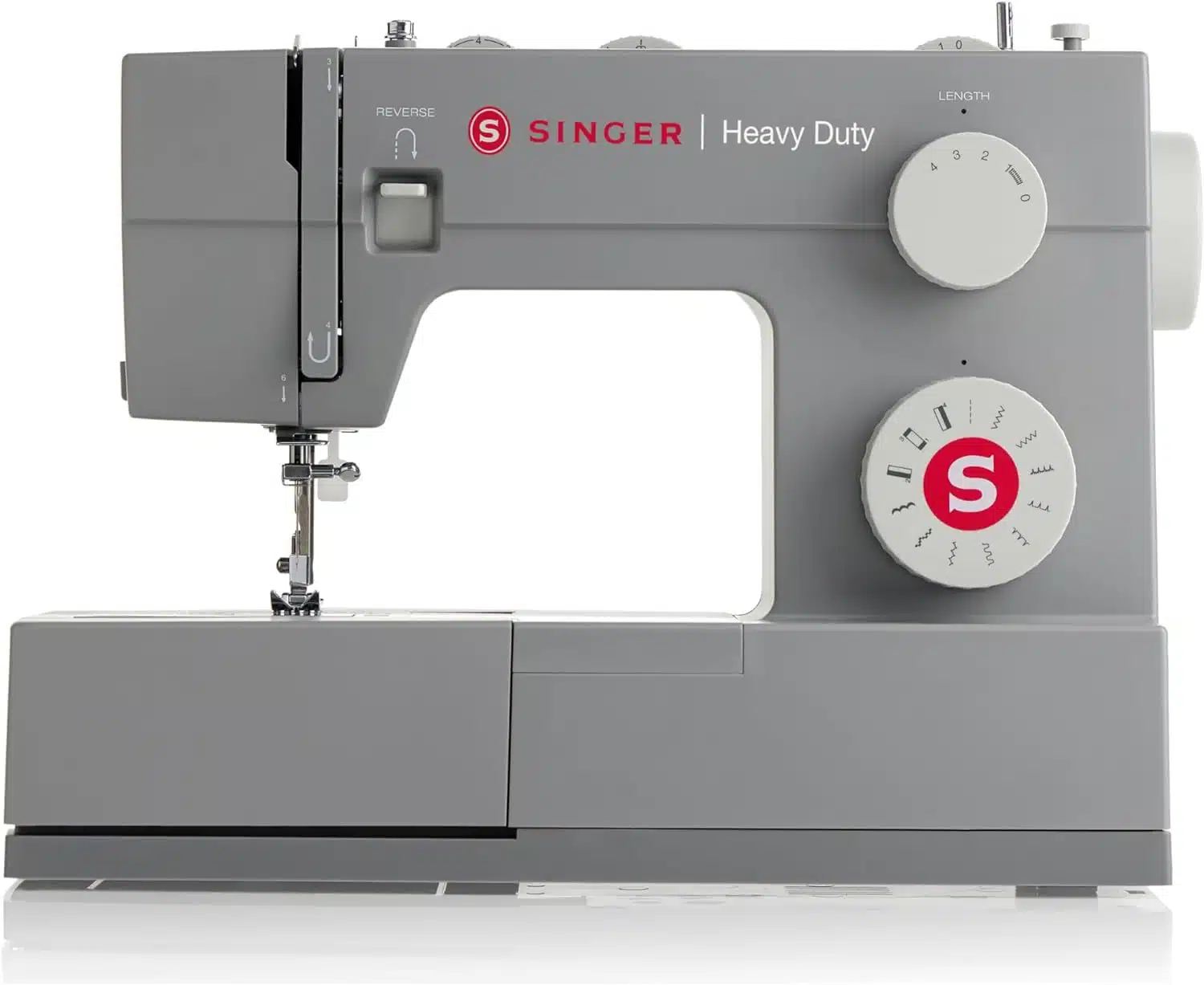 A gray Singer Heavy Duty sewing machine with a simple design, featuring stitch selection dials and a reverse lever on the front. The machine has a sturdy build, ideal for heavy-duty sewing tasks.