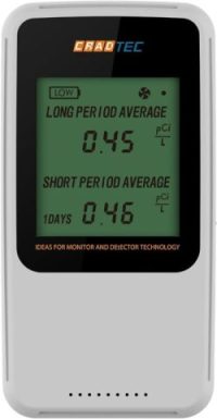 White Cradtec digital radon detector displaying long-term and short-term average air quality levels.